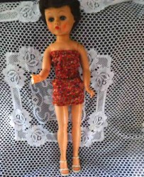 24" TALL 50S VINYL SWIVEL WAIST BRUNETTE TEEN FASHION DOLL, VINYL FACE, SKIRT, WHITE HEELS